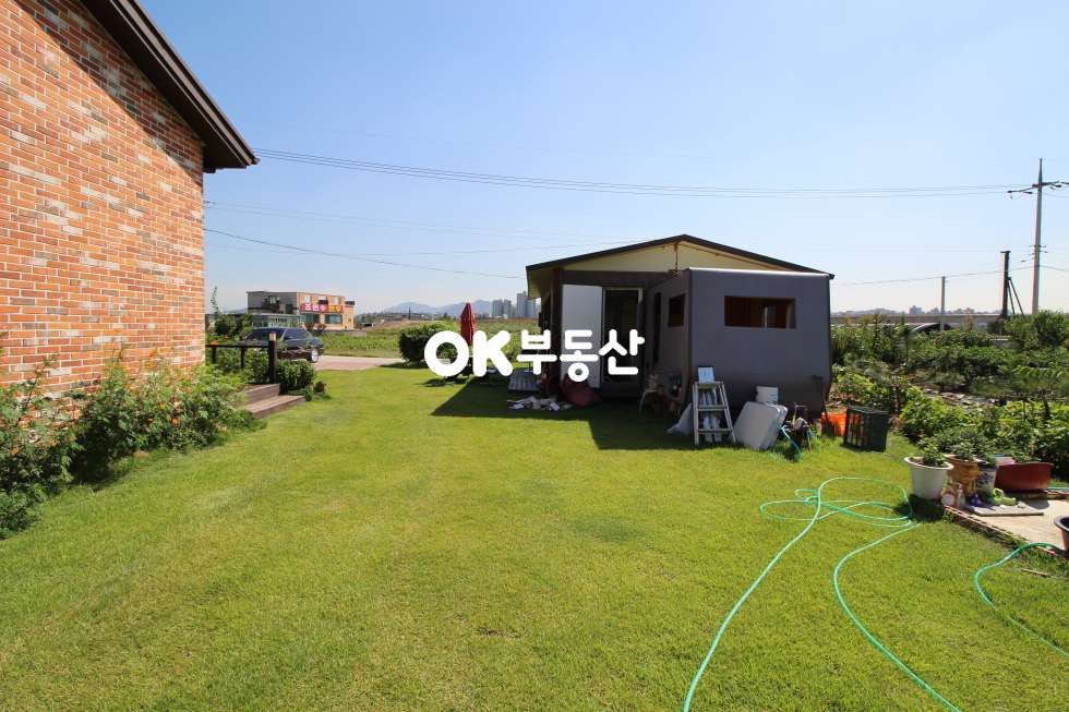 충남 아산시 염치읍 방현리 도로접한 카페 공방등 활용도 높은 입지]아산염치전원주택매매 대지:200평,건물:40평 (지분118평토지 인수시1억추가) 매매 매물번호 10756 사진 6